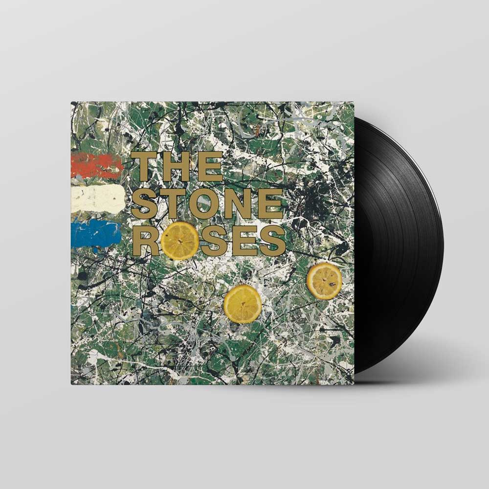 The Stone Roses - The Stone Roses (Vinyl LP) record cover and vinyl sliding out of sleeve on light grey backround