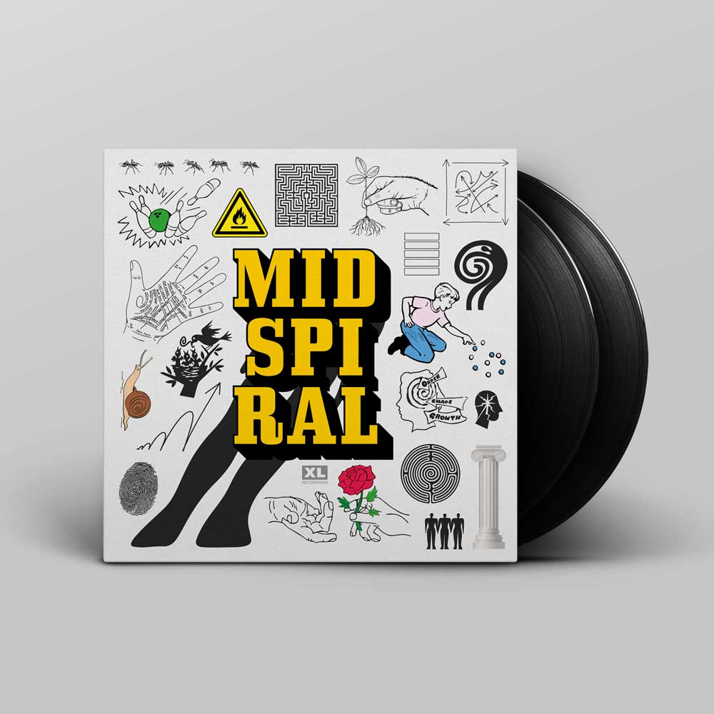 BadBadNotGood - Mid Spiral - (Vinyl 2LP) A vinyl record partially pulled from its album cover, which reads 'MID SPIRAL' in large yellow letters. The cover is white with black doodles and small colorful illustrations, and the record itself is black.