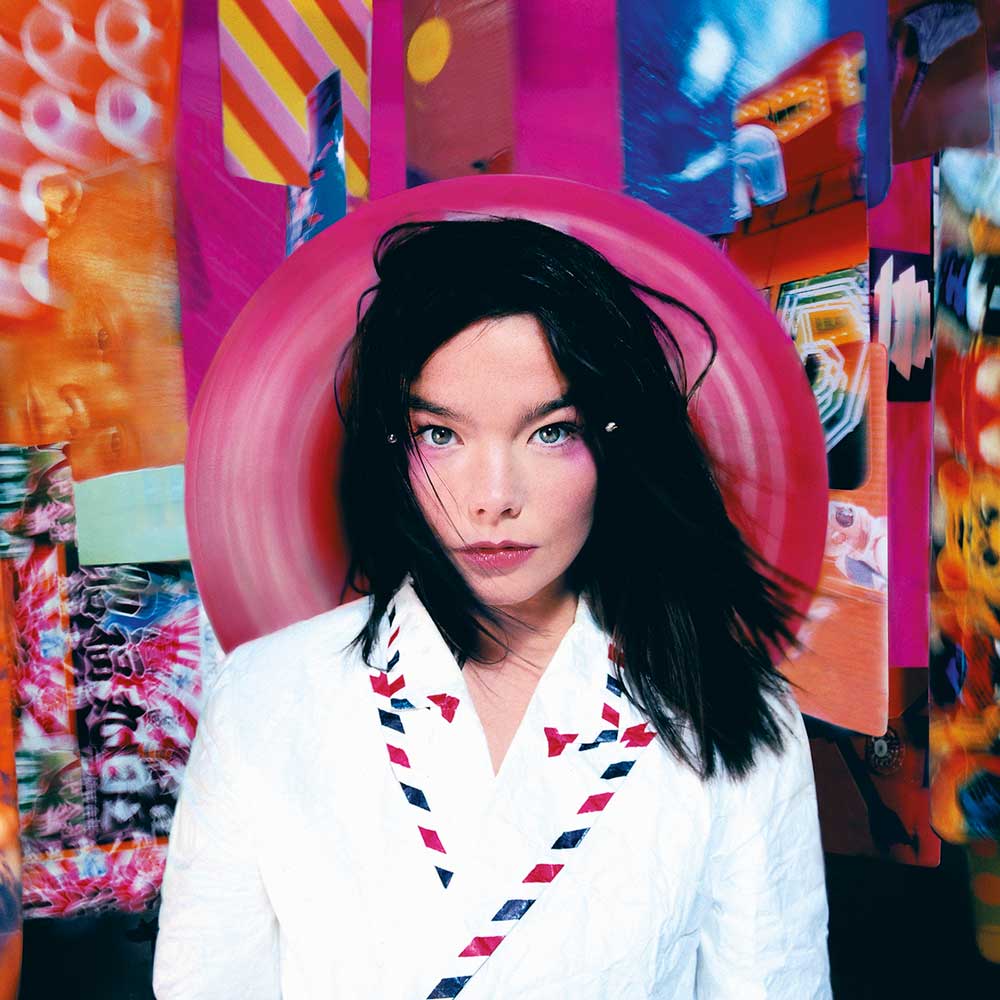Björk - Post Vinyl LP Record cover with Björk wearing a pink hat handing off the back of her head in front of a bright background.