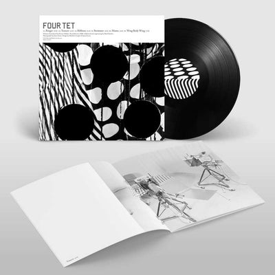 Four Tet - Ringer (Vinyl LP Expanded Edition) A vinyl record album by Four Tet shown with its illustrated sleeve, a partially unrolled black LP, and an open printed photo booklet on a light gray background.