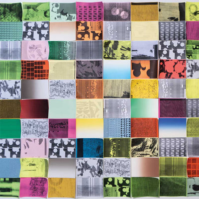 Four Tet - Three (Vinyl LP) record cover A square patchwork artwork made of many small fabric or paper squares arranged in a grid, featuring a wide variety of colors, patterns, and abstract designs including stripes, grids, floral motifs, and solid blocks.