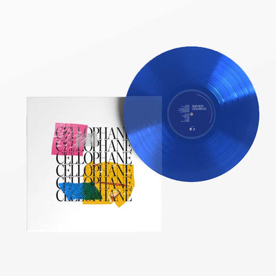 Holy Holy - Cellophane (Vinyl LP Royal Blue) A translucent blue vinyl record partially overlapping its white album cover, which features the word 'CELOPHANE' repeated in black with pink, yellow, and blue abstract color blocks.