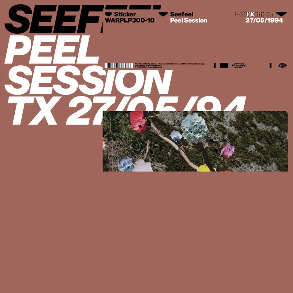 Seefeel - Peel Session (Vinyl 12" EP) SEEFeel 'Peel Session TX 27/05/94' sticker packaging, featuring a dusty terracotta background with bold white typography and a central rectangular inset photo of colorful flowers on mossy ground.