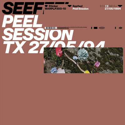Seefeel - Peel Session (Vinyl 12" EP) SEEFeel 'Peel Session TX 27/05/94' sticker packaging, featuring a dusty terracotta background with bold white typography and a central rectangular inset photo of colorful flowers on mossy ground.