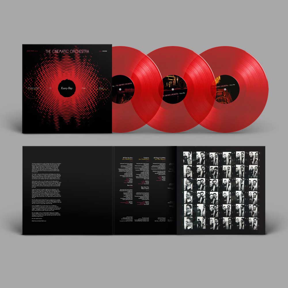 The Cinematic Orchestra - Every Day Vinyl (3LP) 20th Anniversary vinyl record set on a neutral grey background, featuring three translucent red records, a black album cover with a red circular graphic, and an open inner sleeve displaying track listings and black-and-white portrait photos.