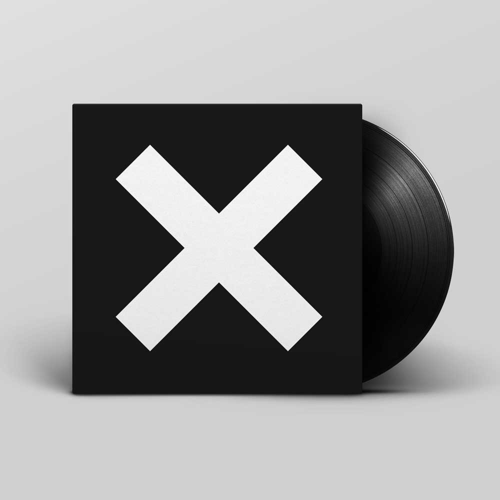 The XX - XX (Vinyl LP) record album cover with the vinyl record sliding out of sleeve